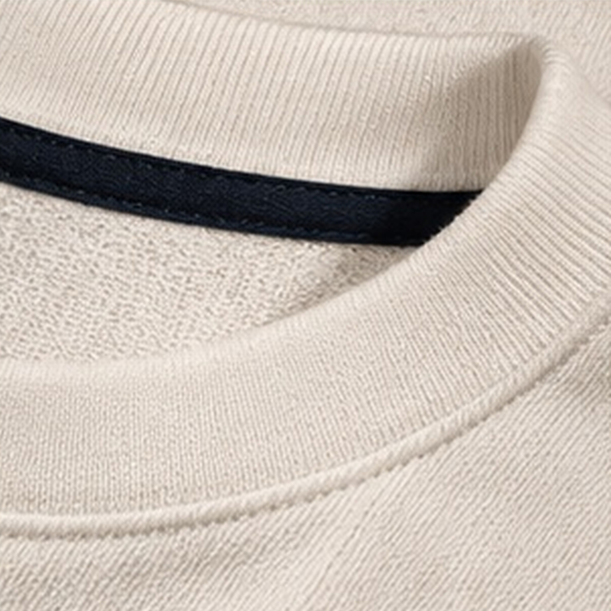Vasudev Krishna oversized cream T-shirt detail shot by DRIPYUG